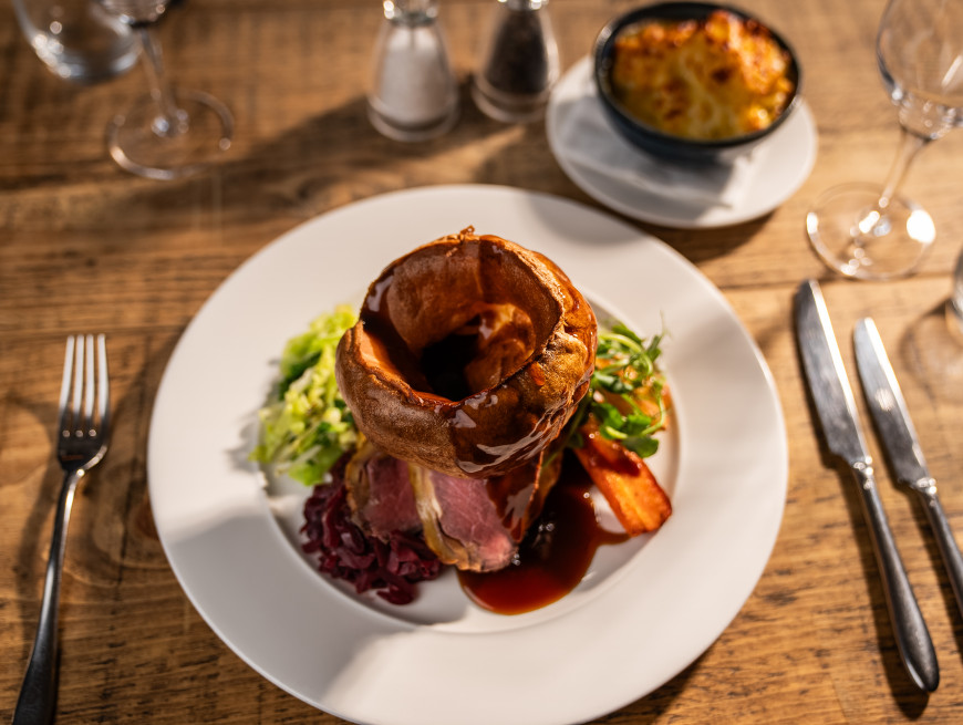 Bedroom with balcony and pool view