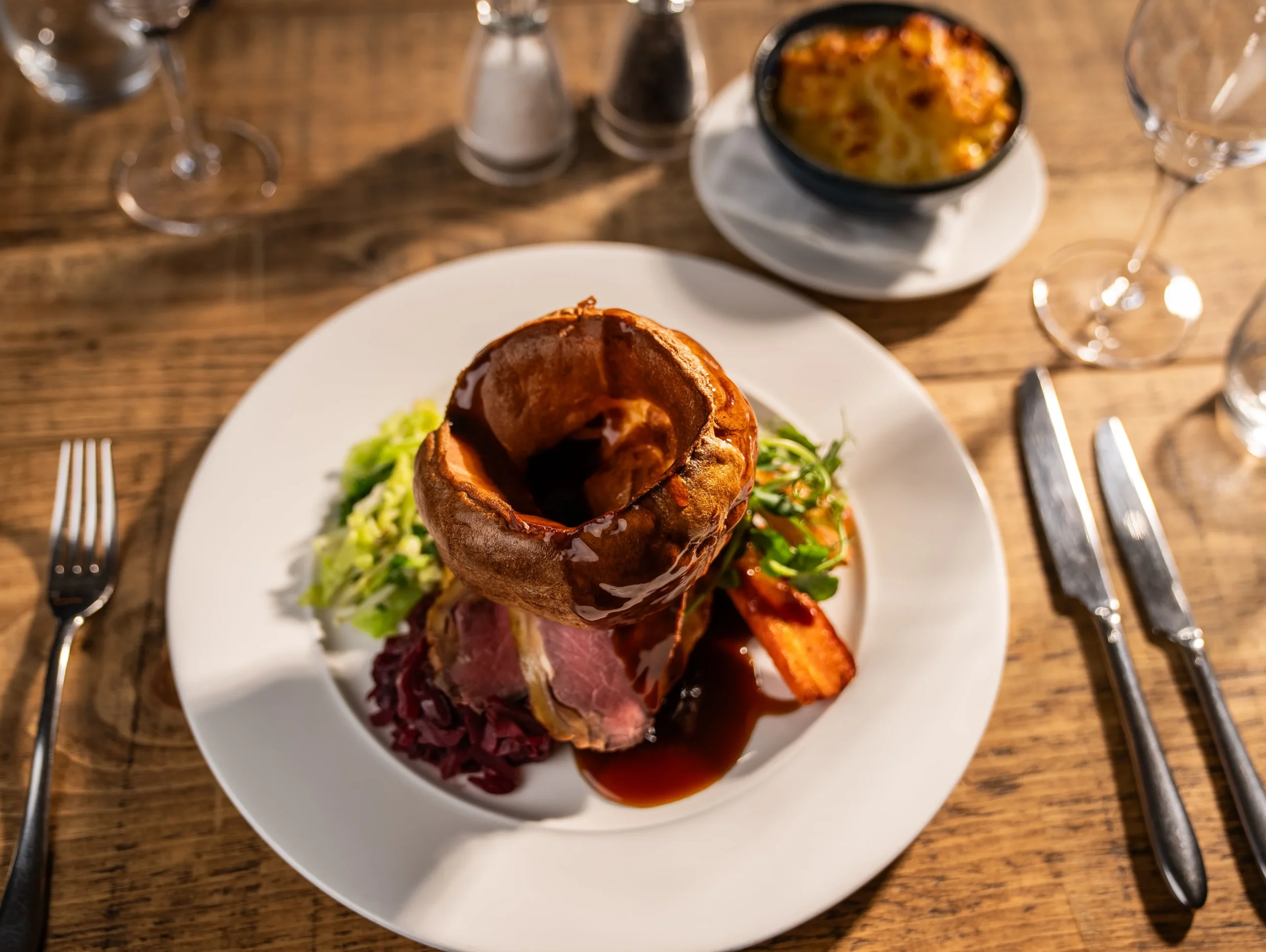 Bedroom with balcony and pool view