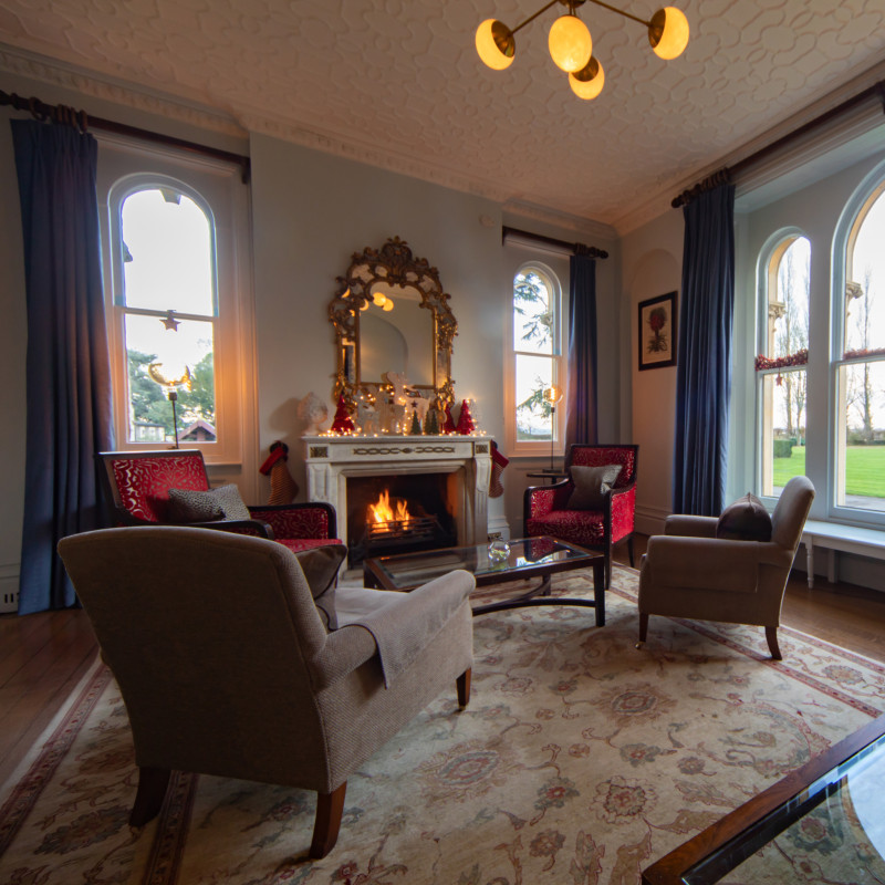 Fireplace and armchairs